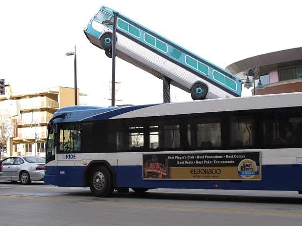 A city bus passes the sculpture in front of the bus station in downtown Reno, Nevada on Wednesday, March 2, 2016. Washoe County&#039;s Regional Transportation Commission and the union representing its bus drivers are locked in a 2-year-old legal battle over whether expanding the audio reach of the bus surveillance recordings amounts to illegal eavesdropping on passengers. (AP Photo/Scott Sonner).