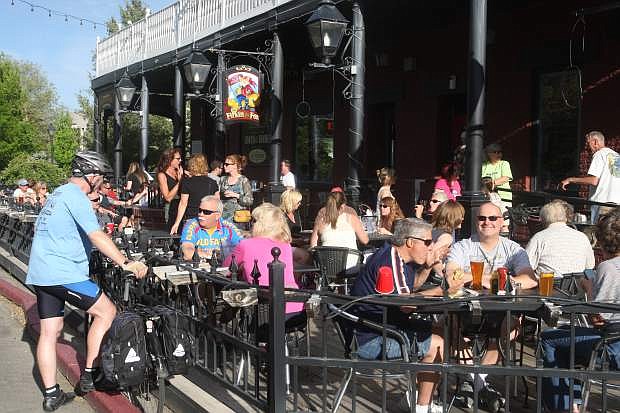Bike Week Party goers convene at the Firkin &amp; Fox downtown Friday evening.
