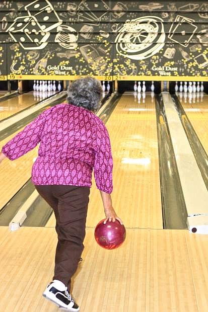 Carolyn Kenton of Gardnerville bowls at the 30th Annual Carson Indian Bowling Tournament Friday at the Gold Dust West.