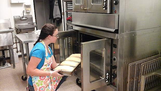 Kristen Coblentz makes bread in the Lattin Farms kitchen. She took over The Bread Girl business from her sister Melissa Coblentz.