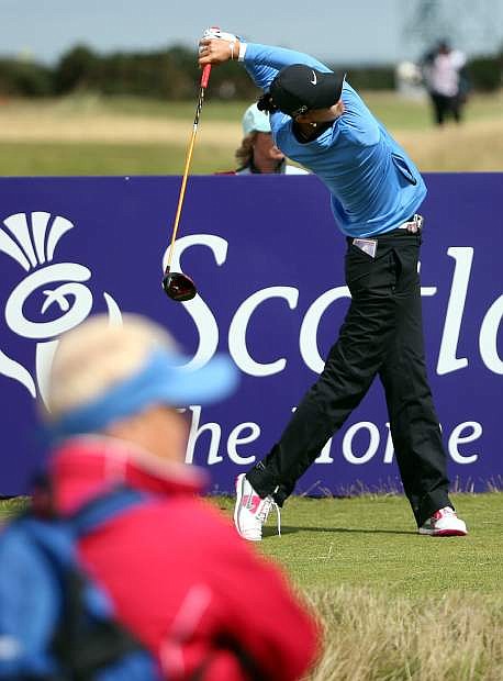 Michelle Wie of the US tees off on the 13th during the third round of the Women&#039;s British Open golf championship on the Old Course at St Andrews, Scotland, Saturday Aug. 3, 2013. (AP Photo/Scott Heppell)