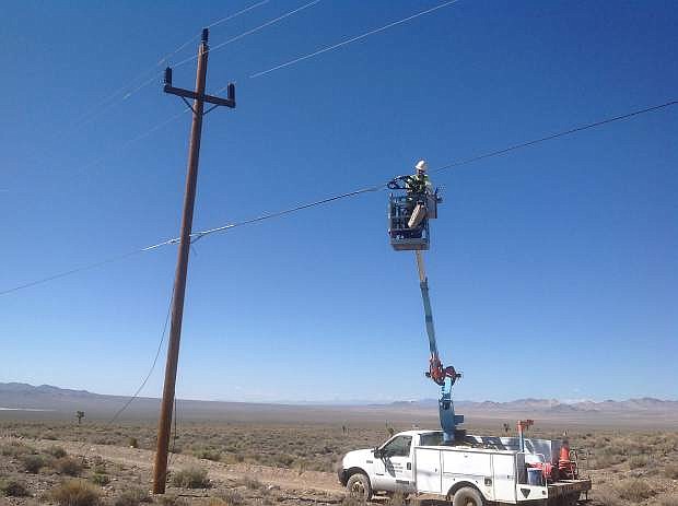 A large portion of a new fiber line across Nevada will be strung from existing utility poles.