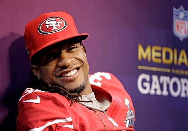 FILE - In this Jan. 29, 2013 file photo, San Francisco 49ers safety Dashon Goldson (38) smiles during media day for the NFL Super Bowl XLVII football game in New Orleans. A person with knowledge of the contract says free agent Goldson has agreed to a $41.25 million, five-year deal with the Tampa Bay Buccaneers. The person spoke on condition of anonymity to The Associated Press on Wednesday, March 13, 2013, because the team had yet to formally announce Goldson&#039;s deal.(AP Photo/Mark Humphrey, File)
