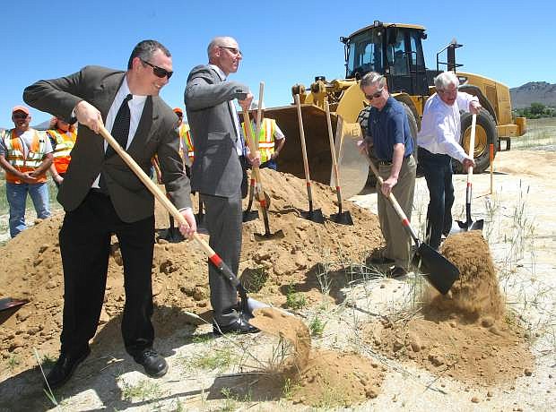 Taking part in a ground breaking ceremony for the final leg of the Carson City Freeway are, from left, Patrick Pittenger, Carson City transportation manager; Bill Hoffman, Nevada Department of Transportation deputy director; Bob Crowell, Carson City mayor and Ron Knecht, state controller.