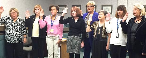 The new CASA&#039;s were sworn in Monday morning in District Court by Judge Tom Stockard (not pictured). From left are Lana Scharmann, Mary Sauer, Celia Crackovich, Lisa Callahan, Susan Warren, Gwen Olson, Debra Braccini and Charlene Aughe.