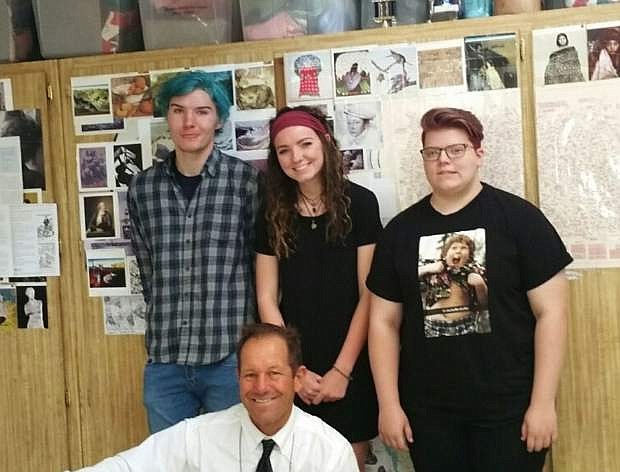Local high schools Charley Andrews, Maeve Hoerth, Jessica Mathiesen and teacher Mike Malley.