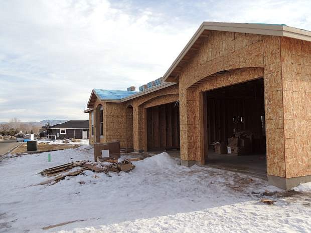 Construction takes place on homes near Silver Oakl Golf Course earlier this week.