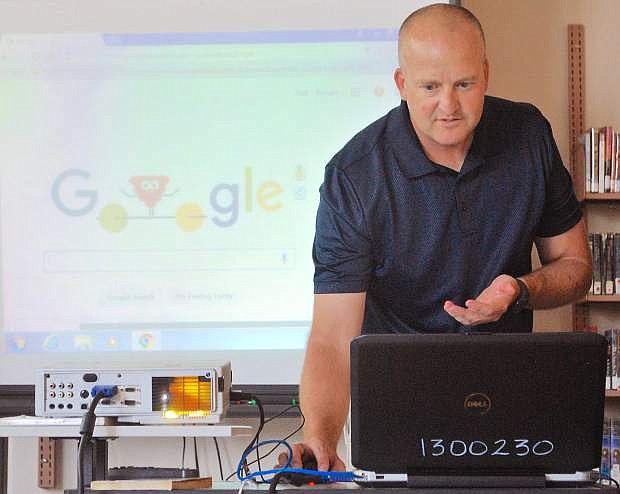 Nate Waite, secondary technology integration coach for Churchill County School District, instructed teachers on Monday about the new Google Chromebooks.
