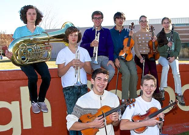 Back Row-Carson High students juniors Rylan Kane, Nicholas Bowler, Henry Sturm, Nick Rosen, Freshman Eleanor Sturm and kneeling- senior Ethan Lopes and freshman Gabe Covington will be playing at Carnegie Hall in New York City in May.