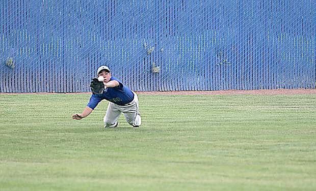 Carson left fielder Seamus Burns makes a diving catch against Galena during Friday&#039;s game.