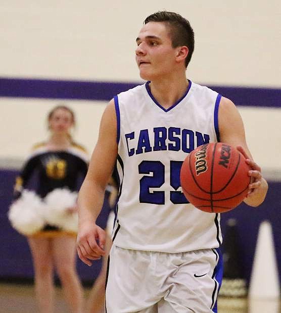 Carson&#039;s Jayden DeJoseph brings the ball upcourt during Friday&#039;s game against Galena.