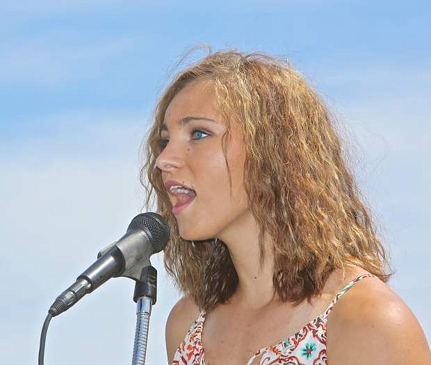 Athena Favero (along with Hector Gomez-Barrios, Ian Van Renssselaer, Eric Hines and Max DeMar) perfomed a OneRepublic song Saturday during the ceremony.