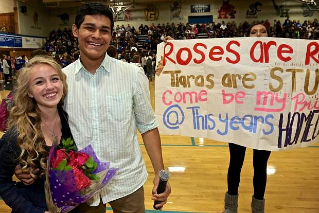 Junior Drew Davalos surprised freshman Shannon Mick with a proposal for a homecoming date prior to the start of the assembly Friday.