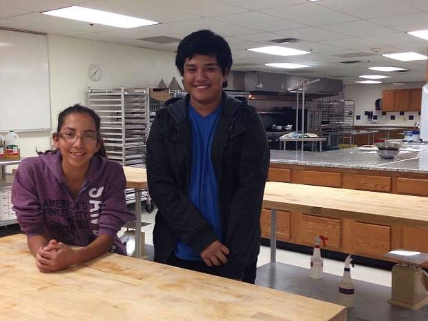 Serena Trujillo, 17 and Cristian Lamas, 17, are the leaders of the Nevada Day cake senior project.