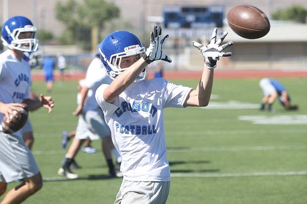 Carson High School varsity football players practice on Thursday.