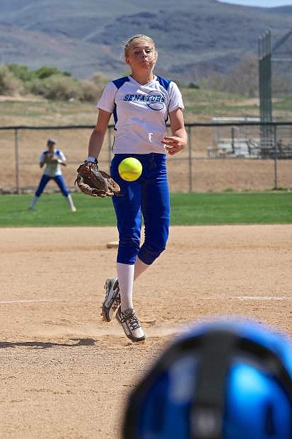 Carson pitcher Lauren Lemburg fires one to a James Logan High batter Friday at Shadow Mountain Sports Complex. The Senators lost the game 7-0.