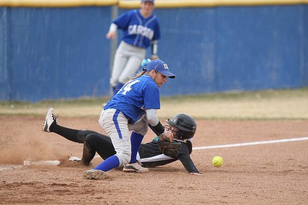 Carson&#039;s Jen Purcell delivers a pitch to a North Valleys batter on Tuesday. Carson won in extra innings.