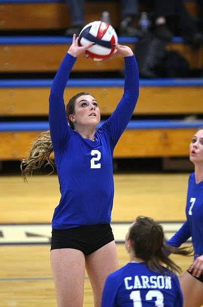Natalie Anderson sets the ball in a match against Damonte Ranch on Tuesday night.