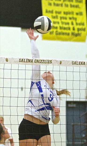 Carson&#039;s Maddie Jergesen nails one back over the net against Galena Thursday night in Reno.