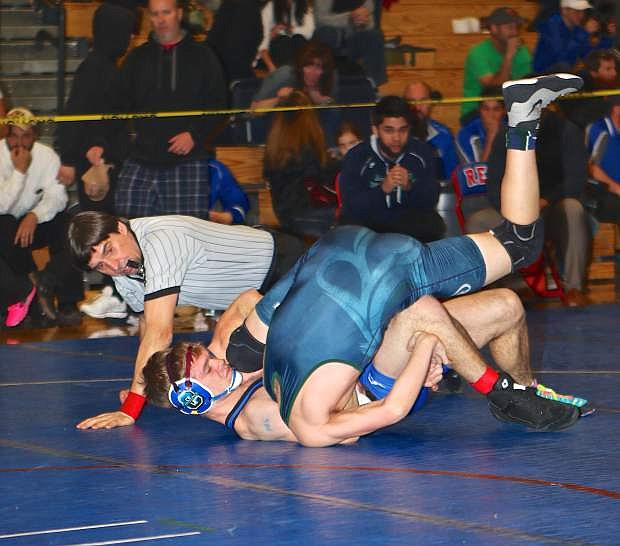 Carson&#039;s Brady O&#039;Keefe defeats Damonte&#039;s Nate Thom in a 145-pound semi-final match at the regional tournment at Reno High Saturday.