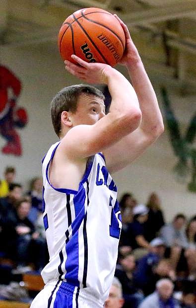 Carson&#039;s Asa Carter takes a jump shot during Tuesday&#039;s game at Carson High against Damonte Ranch.
