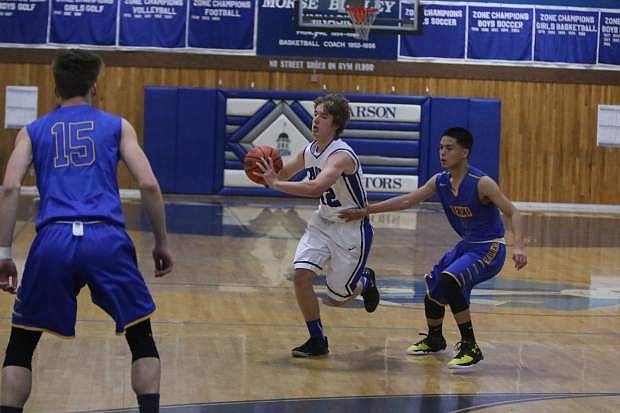 Carson&#039;s Kyle Krebs passes against Reed Tuesday night in the second half.