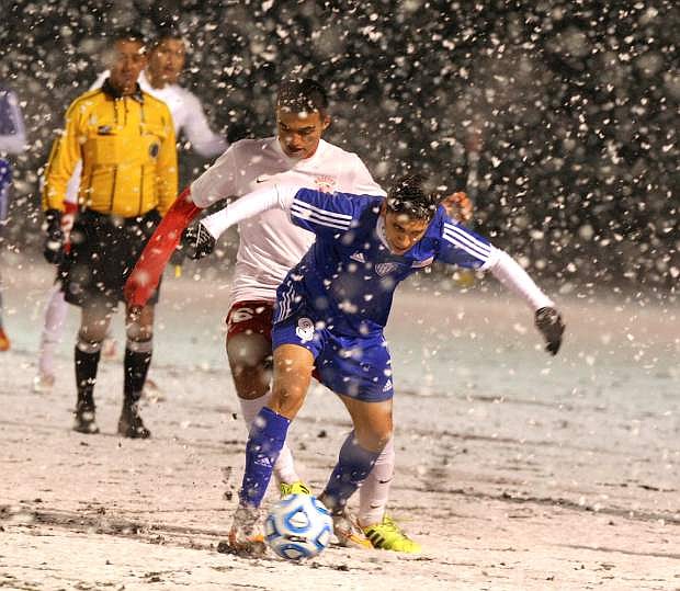 Nevada Appeal photographer Jim Grant won first place for this photo in the sports photography category. The photo is from the Carson High boys soccer game against Wooster in the regional finals during a snow storm in November 2015.