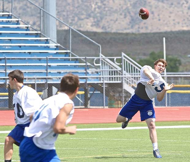 Carson QB Jace Keema throws downfield to one of his receivers this past spring at Carson High.