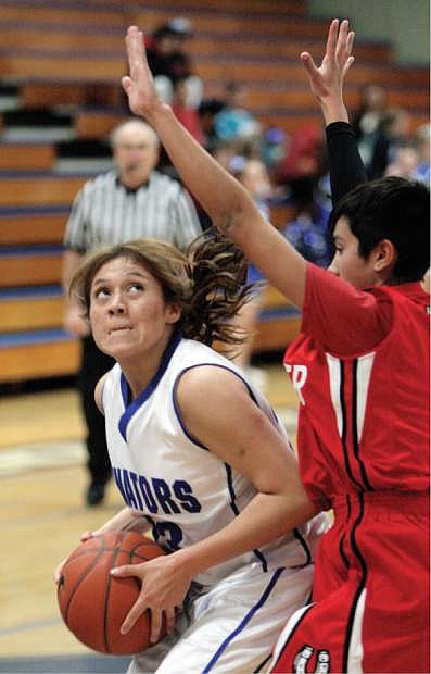 Natali Salas drives to the basket against Wooster on Tuesday.