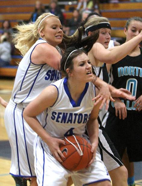Ivy Pembrook battles for an offensive rebound against North Valleys on Tuesday night.
