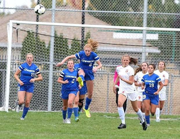 Molly Ott clears the ball from in front of the net after a Douglas corner kick on Tuesday.