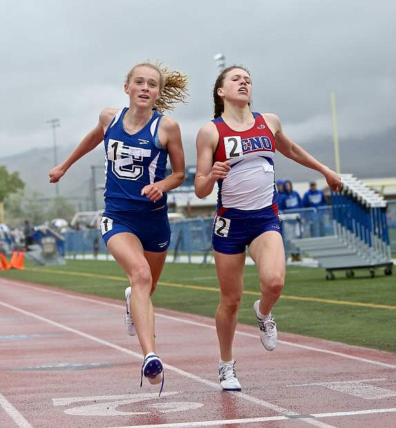 Freshman Abby Pradere narrowly misses pipping Reno&#039;s Kyra Hunsberger for the win at the line in the girl&#039;s 1600-meter event Saturday during the regional qualifier.