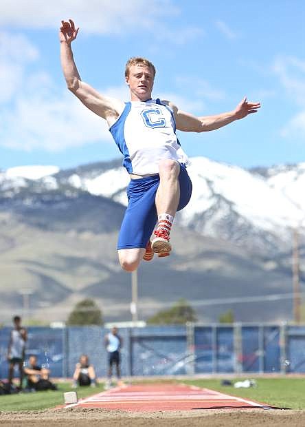 Carson senior Asa Carter competes in the long jump Saturday at Carson High.