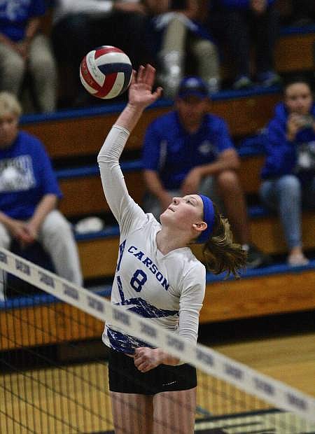 Junior outside hitter Juliana Anderson drills the ball back across the net in a match against Damonte Ranch Thursday night at Carson High. The Senators won in four games, 25-16, 25-20, 26-28, 25-21.