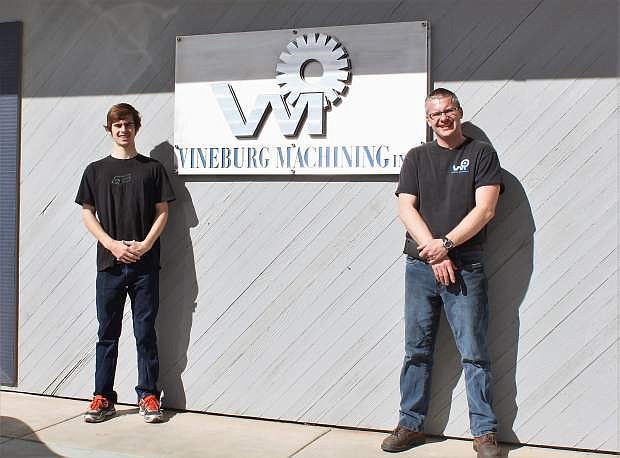 Jacob Kinkel, left, a senior at Virginia City High School is an intern with Vineburg Machining in Carson City. Sven Klatt, right, general manager of Vineburg, said internships are an important means for students to learn about possible career paths, and critical for manufacturers to build a talent pipeline.