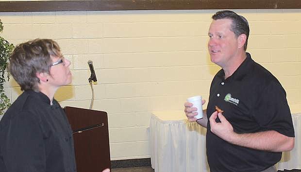 Kelli Kelly, left, who gave a presentation to the Churchill Economic Development Authority on Wednesday, talks to Steve Moon,presdient of CEDA&#039;s Business Council afterward.