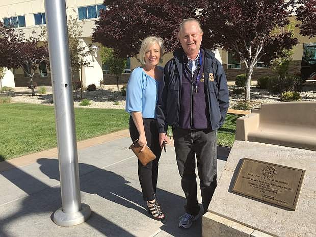 Kitty McKay, director of customer experience at Carson Tahoe Health, stands with Eric Nelson, president of the Carson City Sunset Rotary, following the installation of three new benches at the hospital. The donation is courtesy of Rotary.