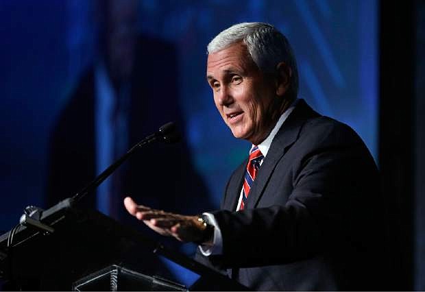 Republican vice presidential candidate, Indiana Gov. Mike Pence speaks at the American Legislative Exchange Council annual meeting in Indianapolis, Friday, July 29, 2016. (AP Photo/Michael Conroy)
