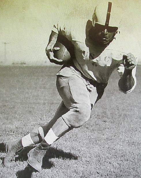 Tod V. Carlini played fullback at Utah State from 1949-51.