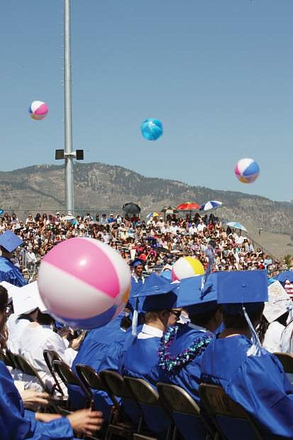 Graduates were given a couple of minutes to have a &quot;beach party&quot; at graduation ceremonies Saturday.