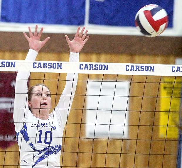 Carson&#039;s Savannah Smith goes up for a block against Reno on Tuesday.