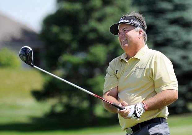 Kenny Perry watches his tee shot on the first hole during the second round of the 3M Players Championship golf tournament at TPC Twin Cities golf course Saturday, Aug. 3, 2013,  in Blaine, Minn. (AP Photo/Craig Lassig)