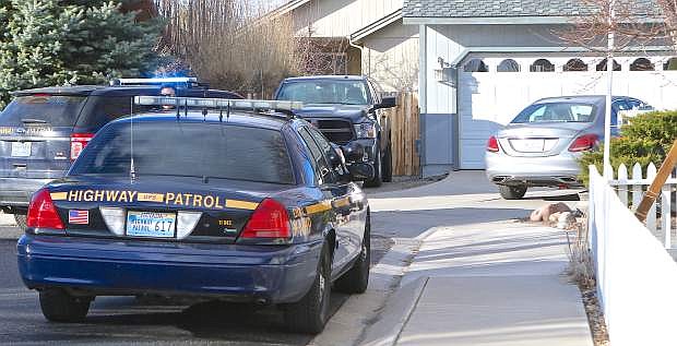 NHP vehicles at 1682 Mackland sit behind a 2015 Mercedes involved in a high-speed chase. The vehicle was abandoned here and the suspect fled on foot.