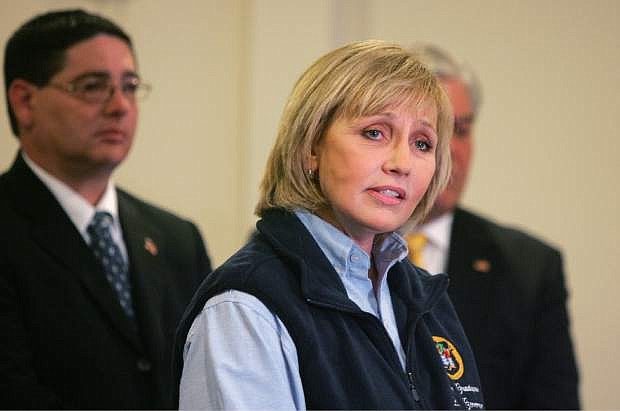 Lt. Gov. Kim Guadagno speaks to the press during the the Dr. Martin Luther King, Jr. National Day of Service in Union Beach, N.J., Monday, Jan. 20, 2014.   Guadagno denied allegations by the Hoboken mayor  that Superstorm Sandy relief funding was withheld from Hoboken because the mayor wouldn&#039;t sign off on a politically connected real estate venture.   (AP Photo/The Asbury Park Press, Tanya Breen)  NO SALES