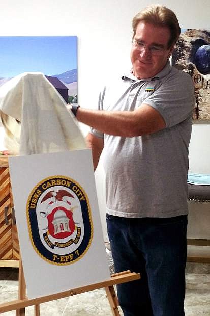 Capt. Bob Wiley, of Carson City, unveiled the coat of arms Thursday night for the USNS Carson City naval vessel.