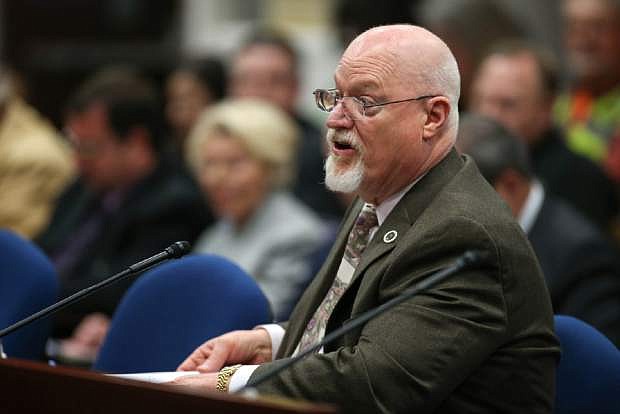 Nevada Assemblyman Randy Kirner, R-Reno, testifies on his proposal to dramatically change collective-bargaining rules for public employee unions in a hearing at the Legislative Building in Carson City, Nev., Wednesday, March 25, 2015. (AP Photo/Cathleen Allison)