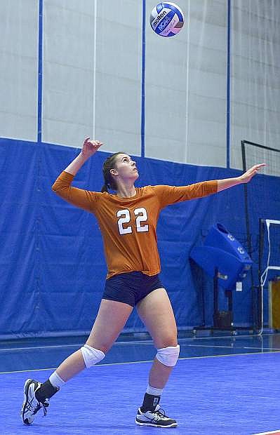 Cady Cordes throws up a serve during a match for Western Connecticut State University this season.