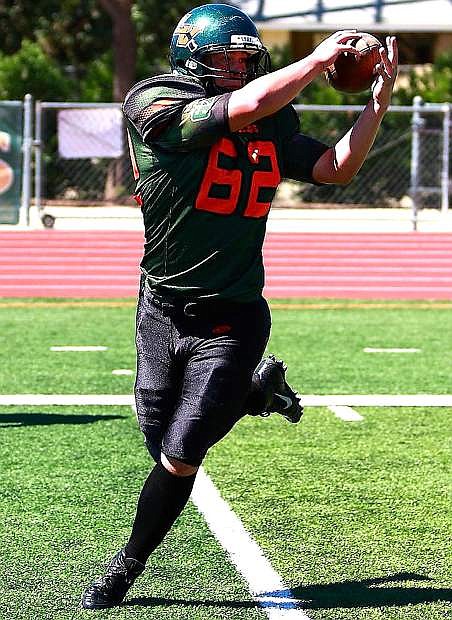Former Fallon and current La Verne linebacker Dalton Johnson warms up before a game last fall.
