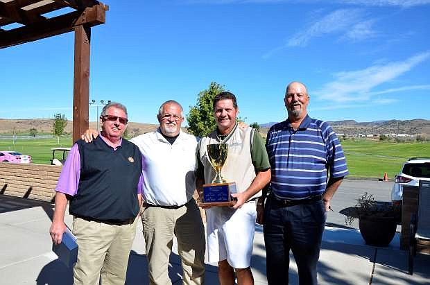 Western Nevada College Golf Classic 2014 tournament winners Jim Kepler, general manager, Eagle Valley Golf Course, Joe Tamburino, Steve McIntire and Mark Sattler.