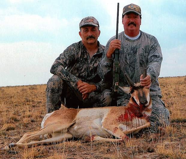 Eric Zimmerman, of Carson City, right, shot his first antelope after hunting for 10 years on a recent trip to Paradise Valley near WInnemucca. He hunted with his brothers, Chris and Paul, who helped Eric bag the antelope from 237-yards.